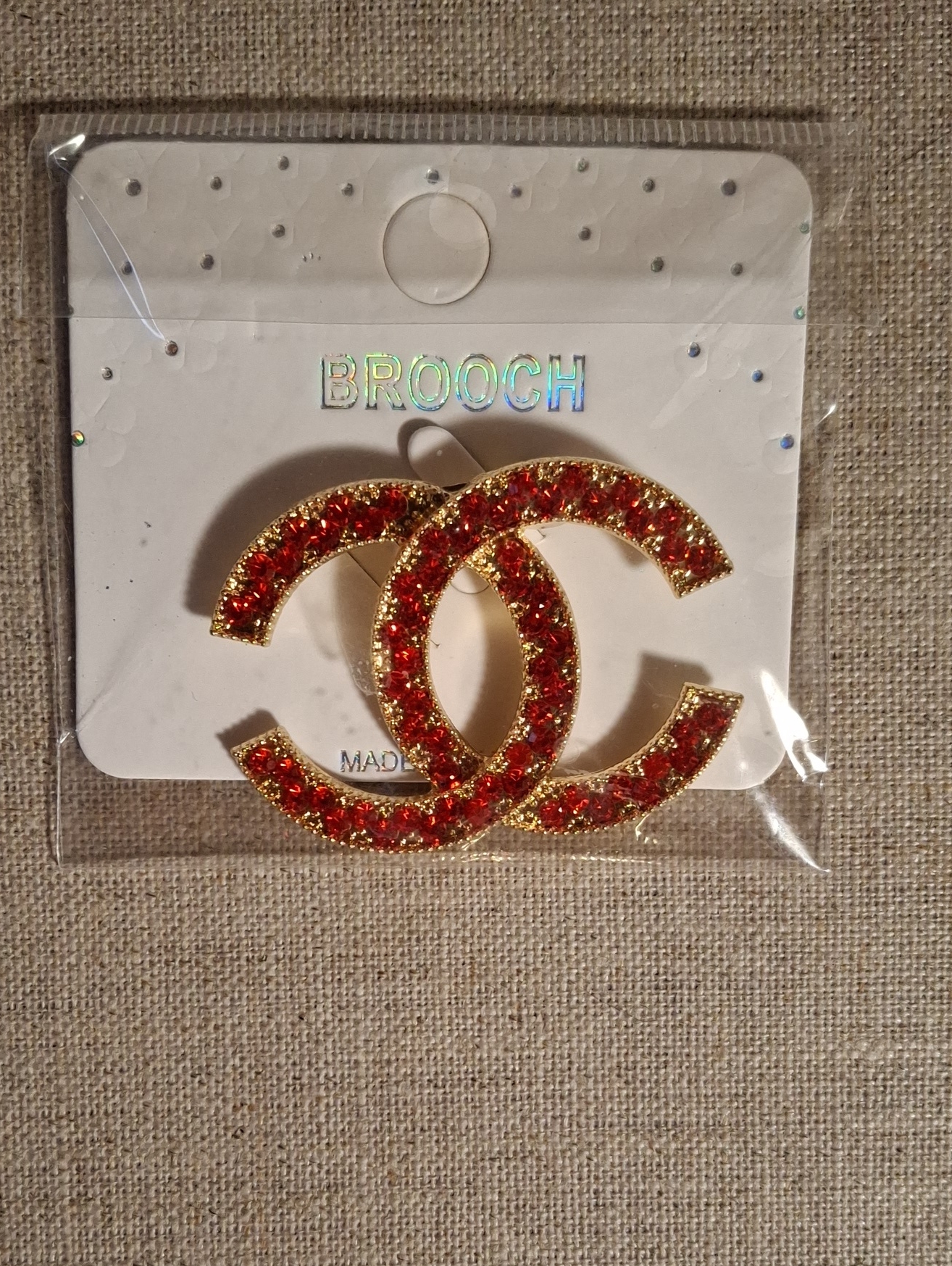 Gold-Tone Red Crystal Double-C Logo Style Brooch